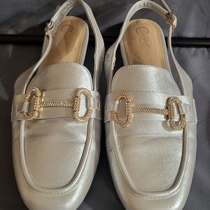 Chic Silver Loafers with Gold Detailing